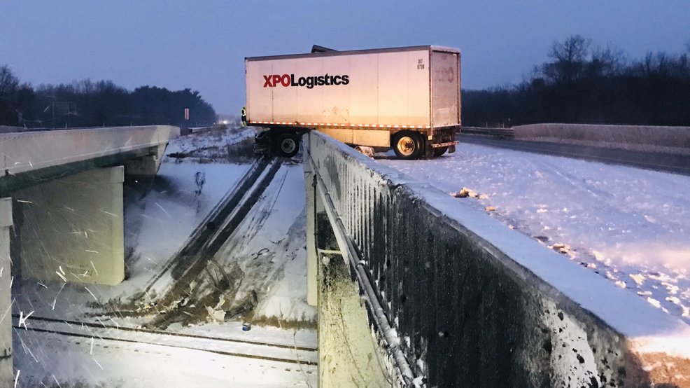 truck flips off overpass