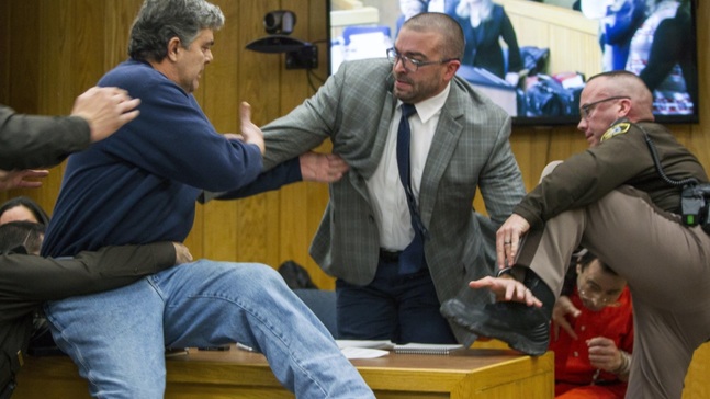 Father Lunges at Larry Nassar