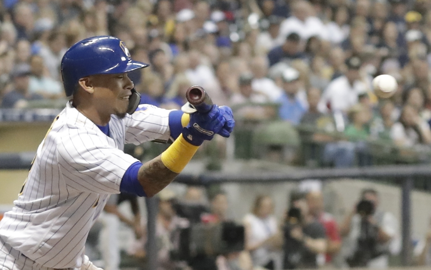 milwaukee brewers orlando arcia hits a two-run scoring bunt for