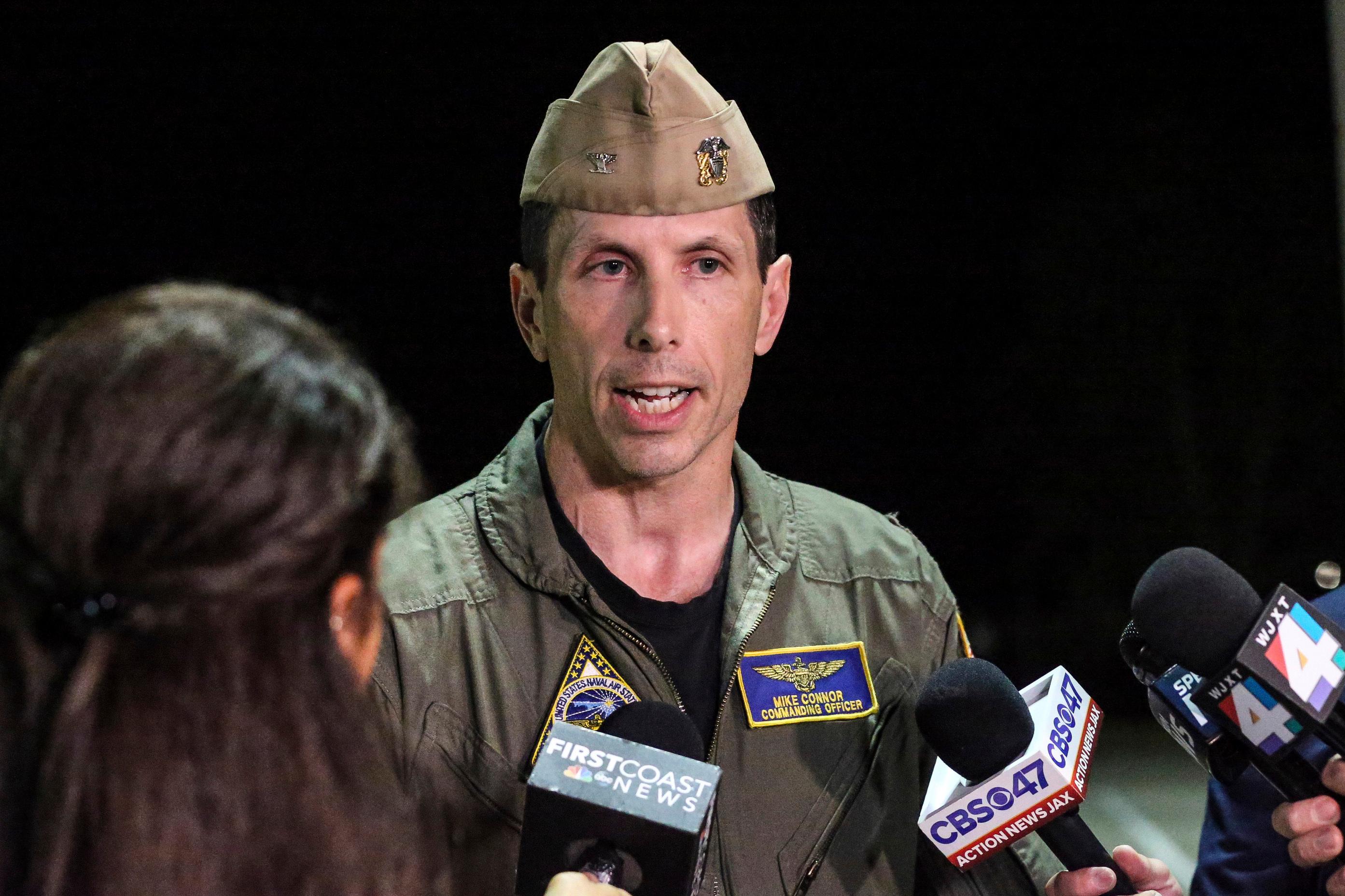 base commander captain mike connor, commanding officer nas